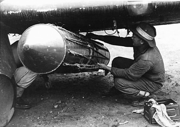 Pacific Wrecks - Ground crew secure a storepedo under the wing of CA-8 ...